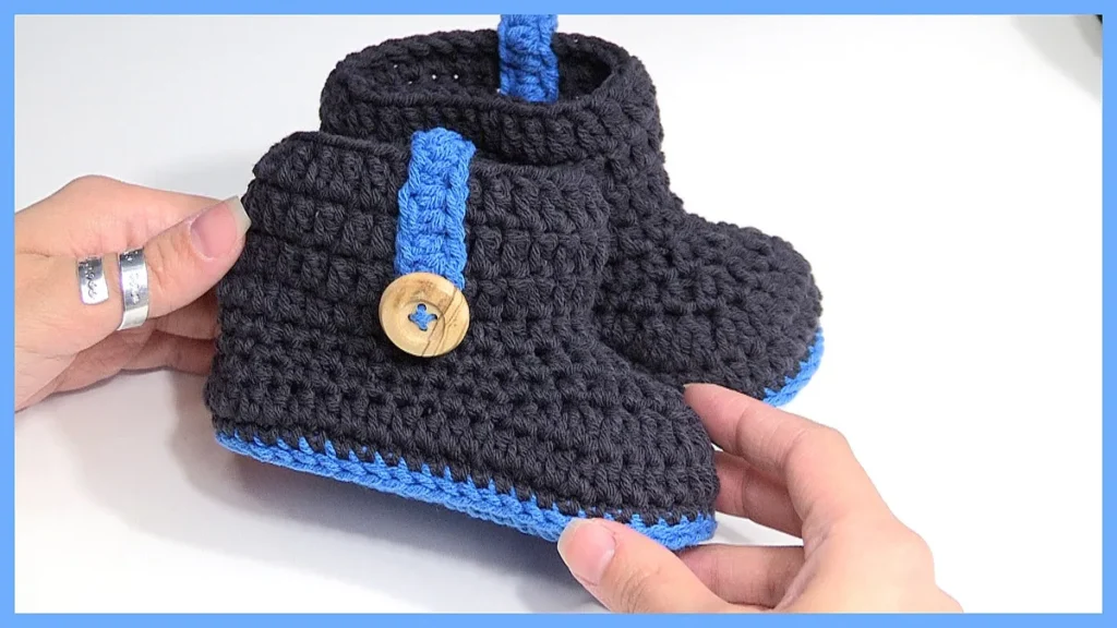 Colorful crochet baby booties for tiny feet