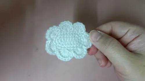 Crochet cloud doll keychain with a pink cone hat β photo 3