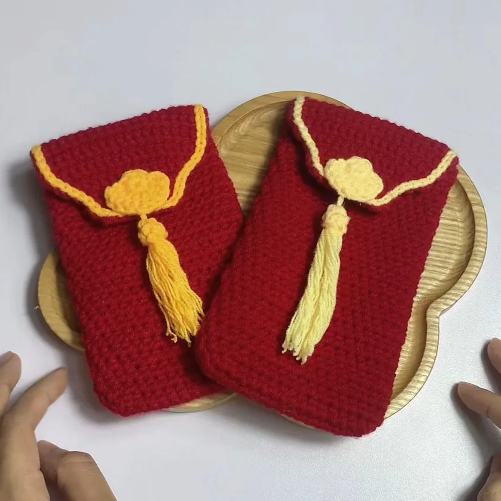 Crochet lucky money bag with a folded flap closure