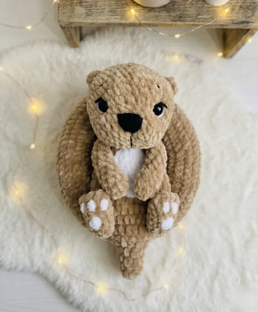 Crochet otter amigurumi pattern with sculpted belly patch