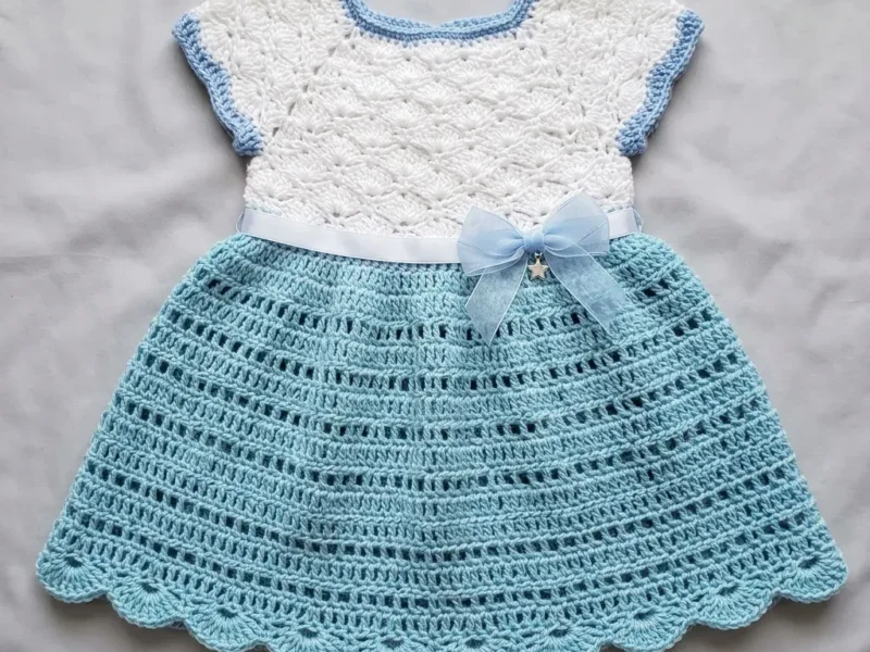 Raglan fan stitch baby dress in two colors