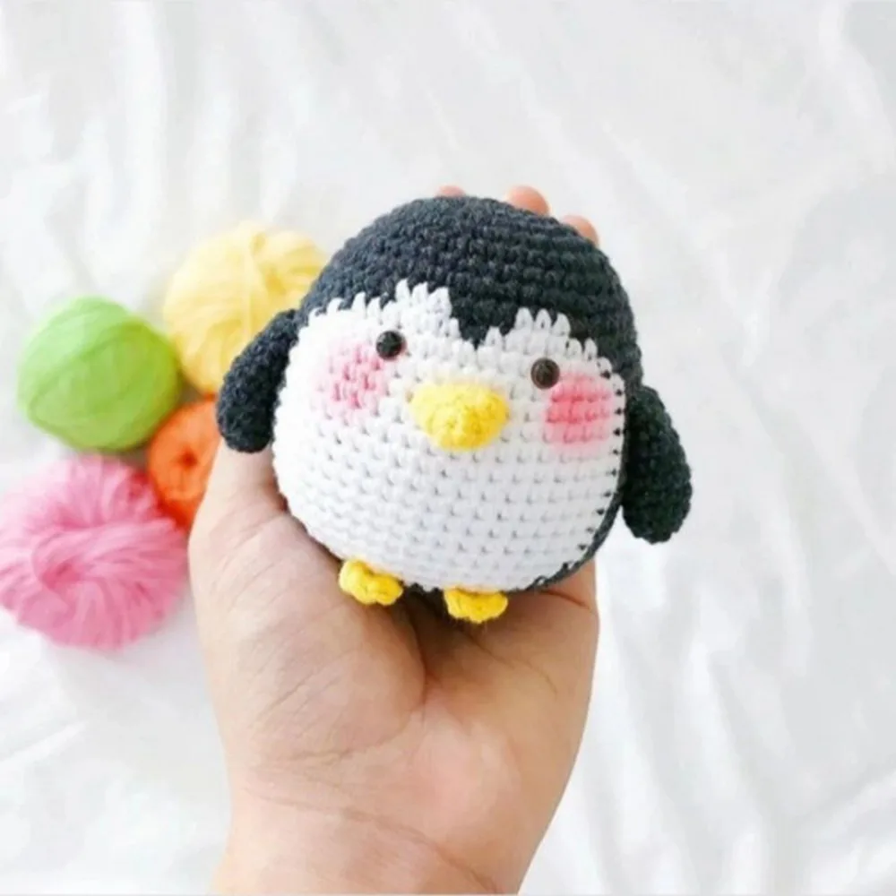 A soft crochet penguin amigurumi for kids to play