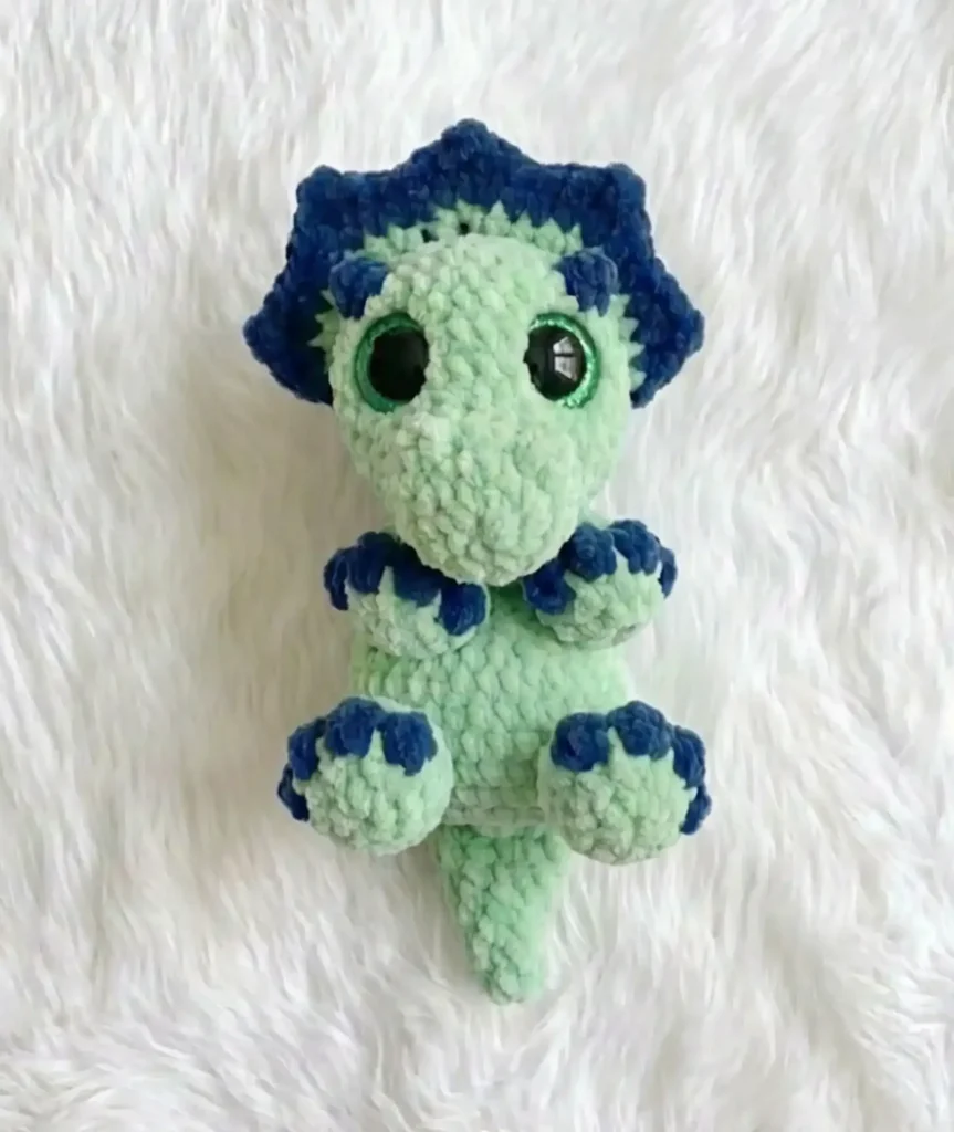 Triceratops crochet snuggler: a horned amigurumi pattern