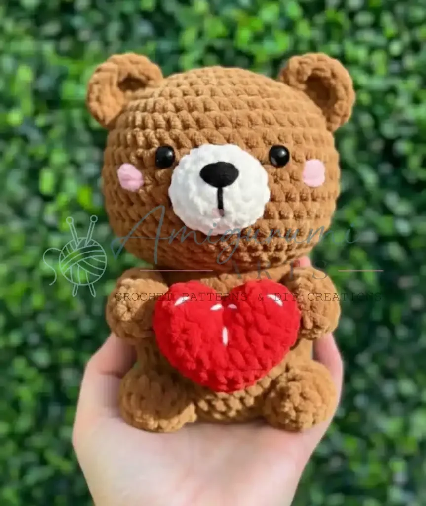 Chunky chenille amigurumi teddy bear with a heart