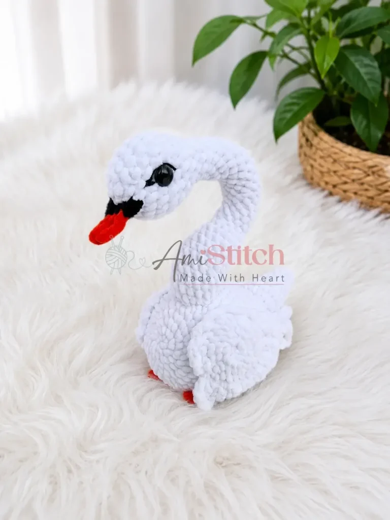 Crochet plush swan amigurumi with velvet yarn