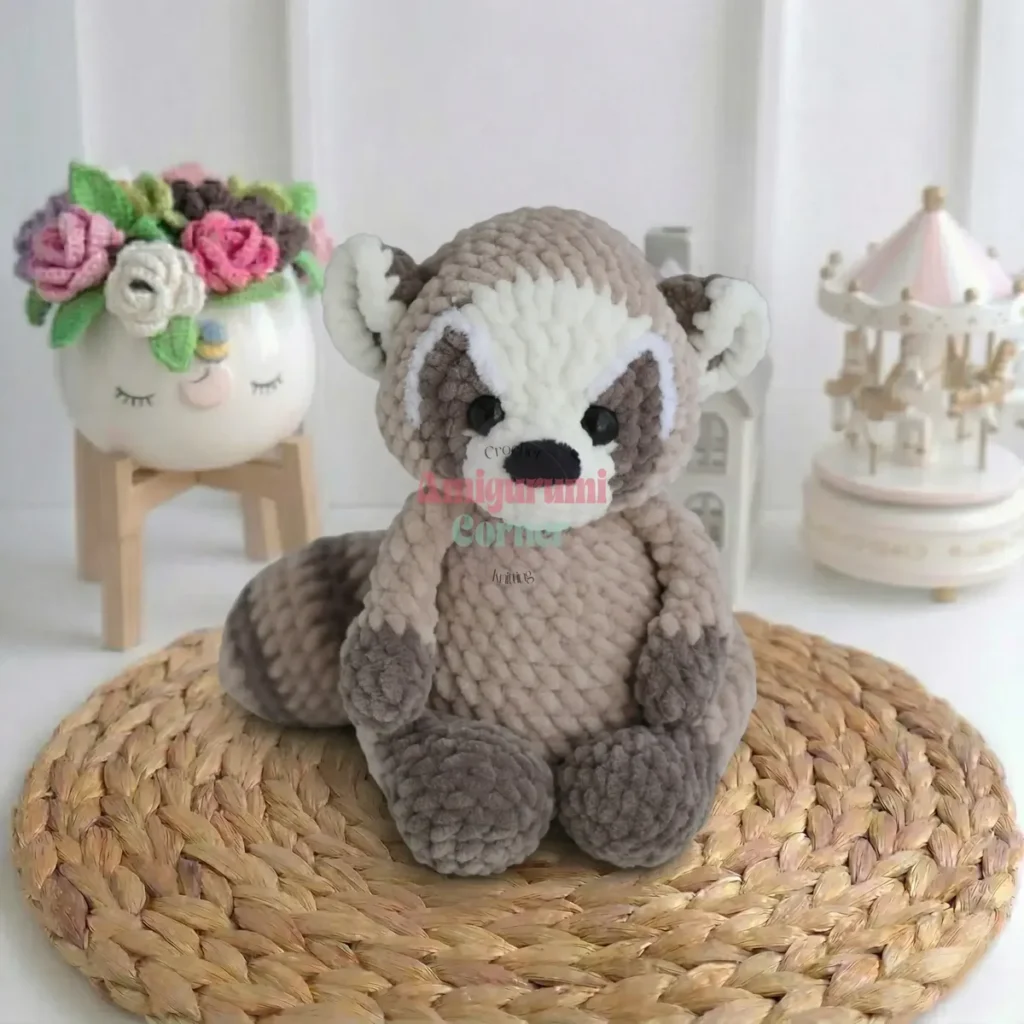 Crochet raccoon amigurumi pattern in chenille yarn