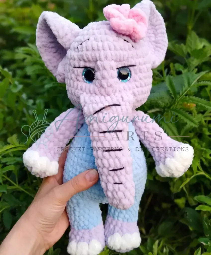 Little elephant amigurumi: trunk, ears, and tiny strawberry